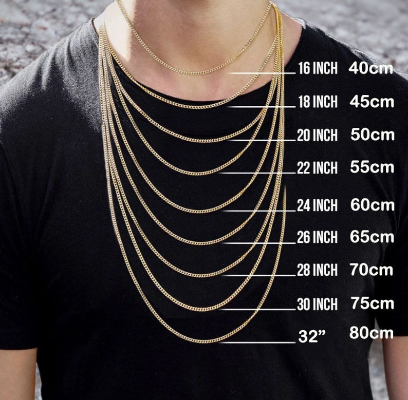 May include: A person wearing a black t-shirt with multiple gold-colored chain necklaces of varying lengths. The image includes text indicating the chain lengths in inches and centimeters: 16 inch (40cm) to 32 inch (80cm).