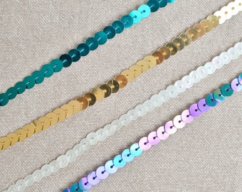 Threaded Sequins 1/4" Wide in Gold, Blue, Iridescent White, and Multi/Purple