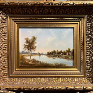 Pintura al óleo original. Preciosa escena de una pequeña casa de campo del siglo XX, enmarcada en un elegante marco dorado.
