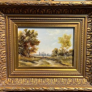 Pintura al óleo original. Preciosa escena de una pequeña casa de campo del siglo XX, enmarcada en un elegante marco dorado.