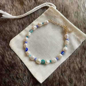 Freshwater Pearl bracelet | | Blue evil eye beads | Gemstones | Handmade | Gold-plated | Adjustable