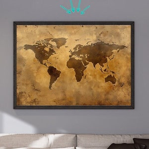 May include: A vintage-style world map print in a brown wooden frame hangs on a gray wall above a beige sofa with brown throw pillows. The sofa is in a living room setting with a wooden coffee table and a potted plant.