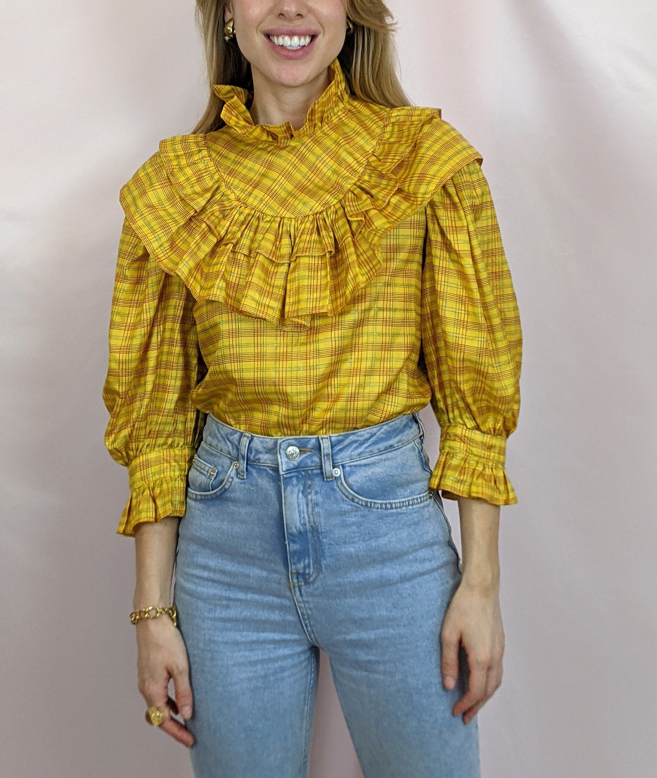 yellow high neck blouse