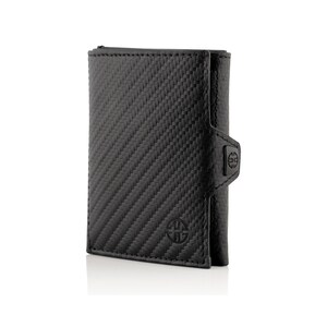 May include: A black leather wallet with a carbon fiber pattern. The wallet has a flap closure and a small logo on the front.
