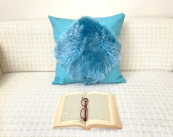 fluffy turquoise pillows
