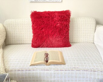 red furry pillows