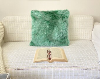 green fuzzy pillow