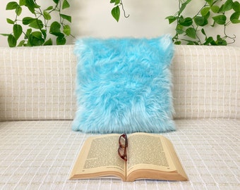 turquoise fur pillows