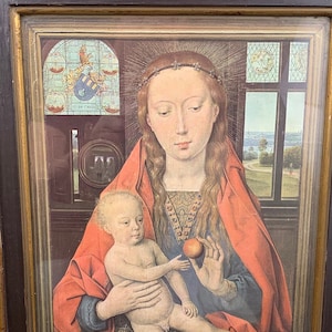 Antique framed colored religious etching behind glass of the Virgin Mary with baby Jesus by Hans Memling.