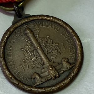 Médaille de guerre de Belgique Première Guerre mondiale Bataille de Liège - Médaille commémorative à ses défenseurs contre l&#39;attaque allemande de 1914.