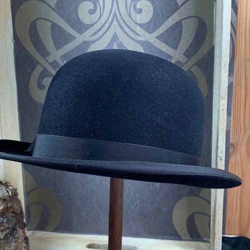 Beautiful black old bowler hat for shops men -