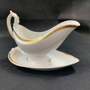 Antique sauce bowl with gold rim