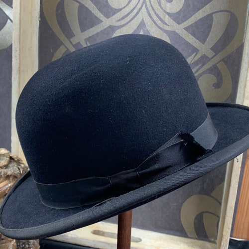 Beautiful black old bowler hat for shops men -