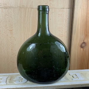 Old green glass wine bottle/Rustic bottle/Decorative bottle/Farmhouse style/Decorative object in a country kitchen/Old bottle with character