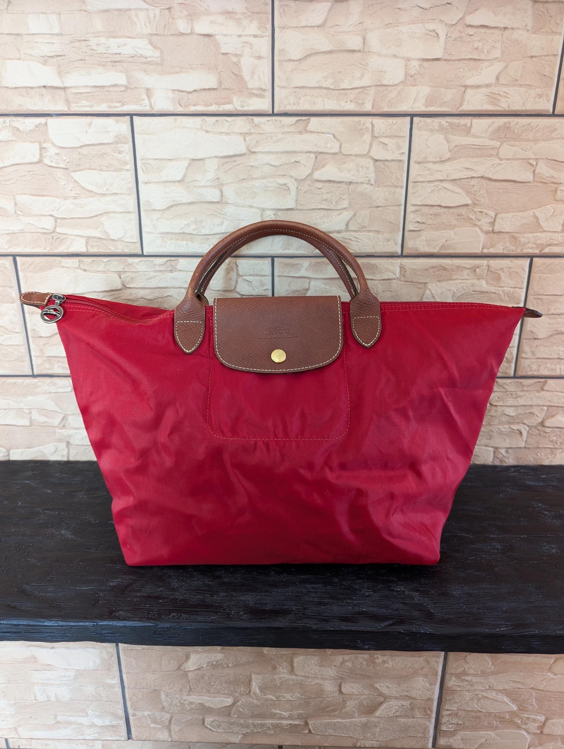 Red longchamp bag hotsell