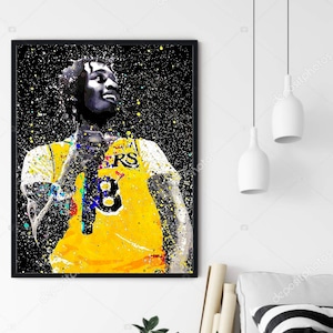 May include: A digital painting of a basketball player wearing a yellow jersey with black and purple trim. The jersey has the word "Lakers" on the front and the number "8" on the chest. The player is standing in front of a black background with white and coloured paint splatters.