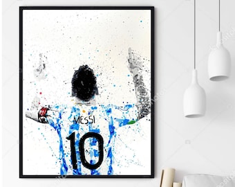 May include: A watercolor painting of a soccer player wearing a blue and white jersey with the number 10 and the name "Messi" on the back. The player is raising their arms in celebration. The background is white with blue and green paint splatters.