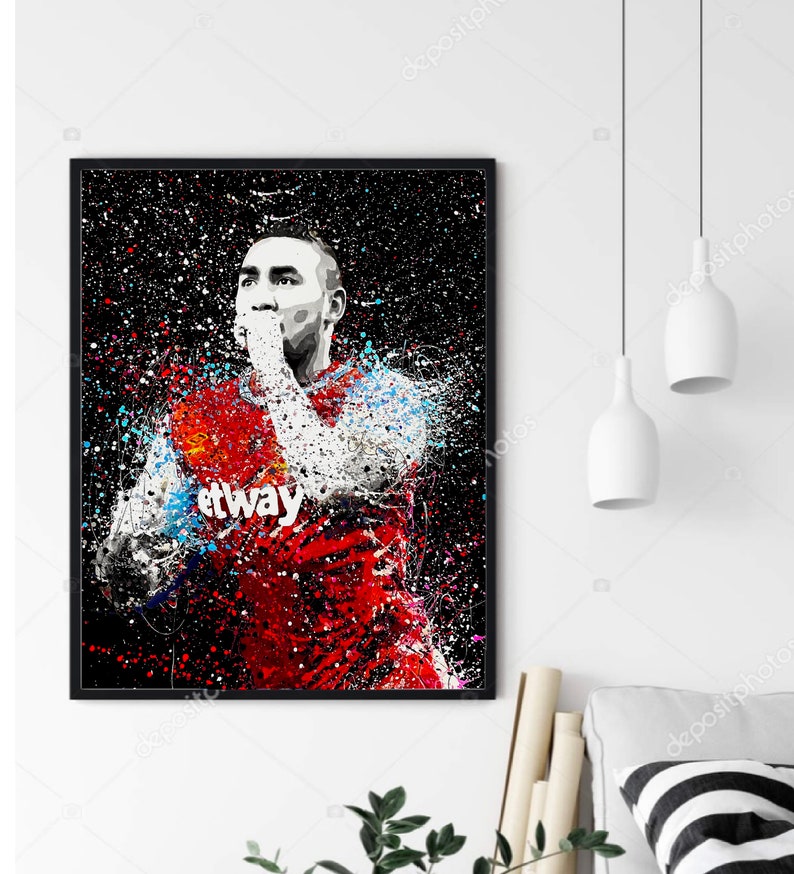May include: A digital painting of a soccer player in a red and blue jersey with the word "Betway" on the front. The player is wearing a white headband and has a determined expression on his face. The background is black with white and blue paint splatters.