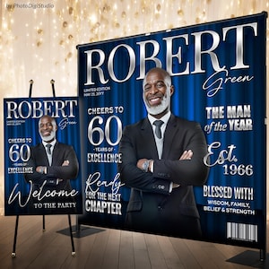 May include: A blue and silver banner and easel display for a 60th birthday celebration. The banner features a photo of a man in a suit, the name "Robert Green", and the text "Cheers to 60 Years of Excellence".
