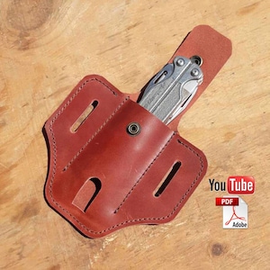 Może przedstawiać: Brązowa skórzana pochwa na wielofunkcyjne narzędzie z zatrzaskiem. Pochwa ma dwie pętle na pasek i jest przeznaczona do przechowywania wielofunkcyjnego narzędzia. Obraz zawiera tekst "YouTube" i "PDF".