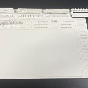 May include: A white tabletop role-playing game (TTRPG) mat with printed sections for player stats and game information. Includes a red and white marker. The mat has a built-in dice tray and space for notes.