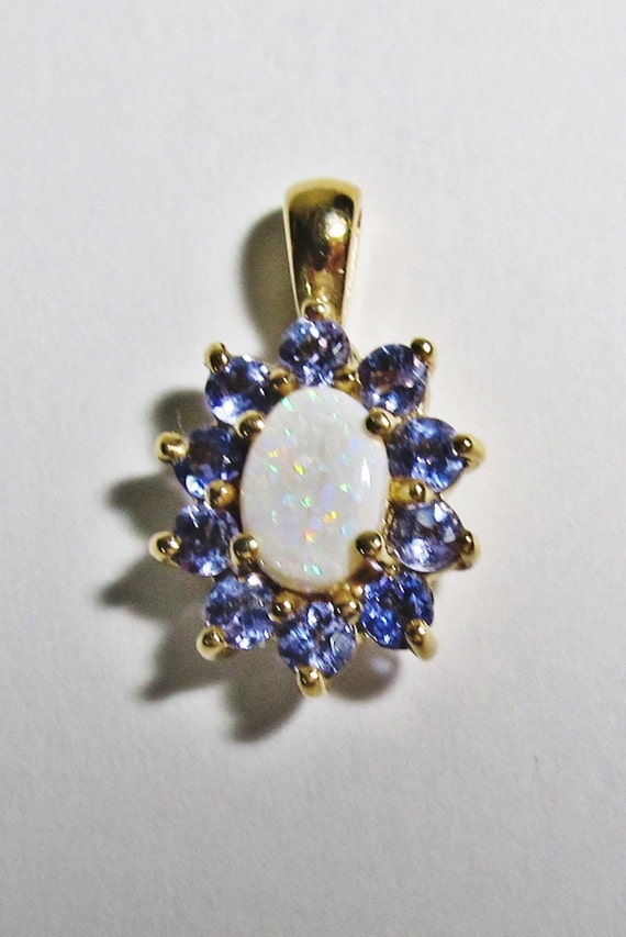 Stunning Opal with a Tanzanite Halo Pendant 10K Ye