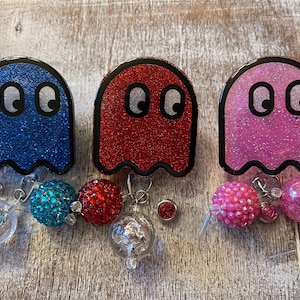 Ghost Game badge reels with charms