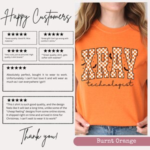 May include: Burnt orange t-shirt with the text "XRAY technologist" in a checkered pattern. The design includes small bat graphics. The shirt is a crew neck and has positive customer reviews displayed on the left.