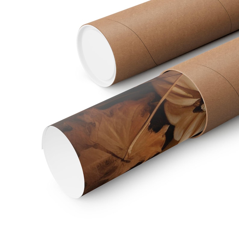 May include: Two brown cardboard poster tubes with white end caps. One tube is partially unrolled, revealing a print with a close-up of brown and tan leaves. The other tube is closed.