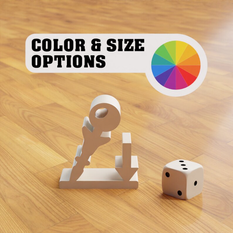 May include: A white, 3D model of a key with a round head, a downward arrow, and a dice. The key is on a wooden surface. The text "COLOR & SIZE OPTIONS" is on a white banner with a rainbow color wheel.