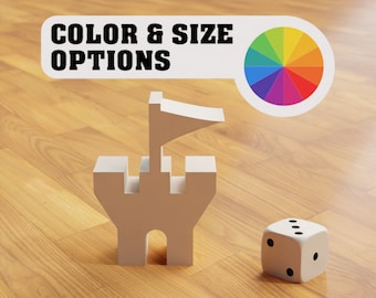 May include: A white castle toy with a flag on top, a white die with black dots, and a color wheel with the text "COLOR & SIZE OPTIONS" above it.