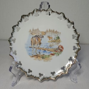 Vintage openwork porcelain plate with nature and elks, hand painted, gold trim, signed BODIE