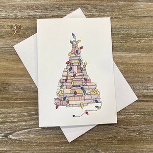 Joyeux Bookmas ! | Sapin de Noël composé de livres enfilés de lumières | Cartes de vacances uniques | Cartes de Noël sympas