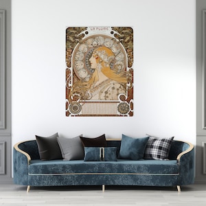 May include: A vintage art nouveau poster featuring a woman with flowing hair and a crown of flowers. The poster is titled "La Plume" and is framed in a decorative border.