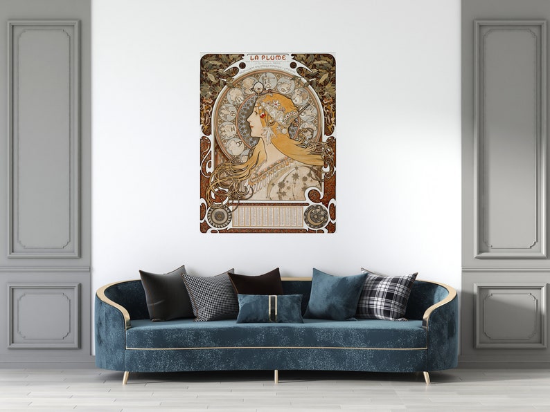May include: A vintage art nouveau poster featuring a woman with flowing hair and a crown of flowers. The poster is titled "La Plume" and is framed in a decorative border.