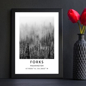 May include: Black and white photograph of a misty forest with the text "FORKS WASHINGTON 47.9504&deg; N, 124.3855&deg; W" printed below.