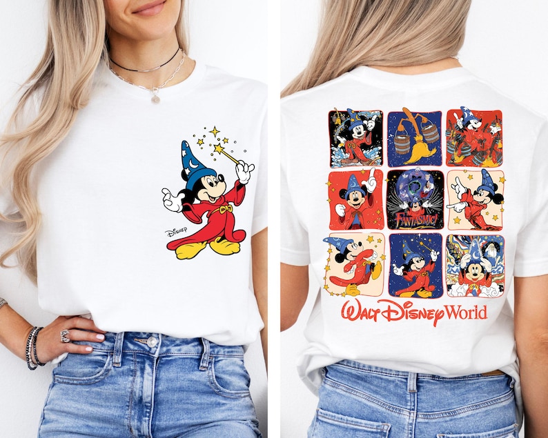 May include: White t-shirt featuring a colorful illustration of Mickey Mouse in a sorcerer's outfit, holding a magic wand. The back of the shirt displays a grid of Mickey Mouse images and the text "Walt Disney World".
