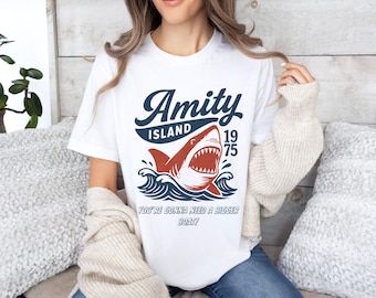 ジョーズ アミティ・アイランド 1975 ユニセックスTシャツ、映画にインスパイアされたギフト、映画ファンのためのコットンTシャツ、レトロなサマーシャツ、ヴィンテージビーチTシャツ、トレンディなシャツ