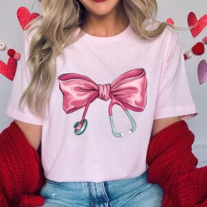 Coquette Nurse Stethoscope Bow Sweatshirt, Gift for Nurse, Bow Oversized Shirt, Nurse Appreciation, Valentine&#39;s Day Gift for Nurse, Pink Bow