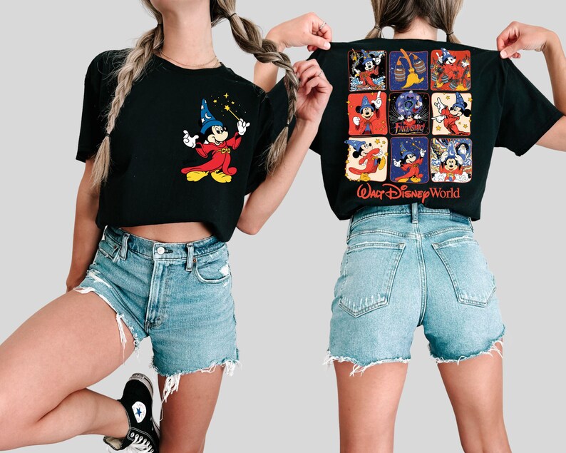 May include: Black t-shirt featuring Mickey Mouse as a sorcerer on the front and a collage of Mickey Mouse images with "Walt Disney World" text on the back. The shirt has a classic crew neck and short sleeves.