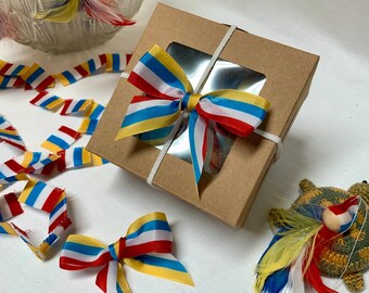 Individually wrapped Meenzer Fastnacht feather angels - angels and more