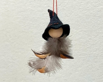 Halloween autumn decoration witch made of feather and felt - magical feather witches float through the air