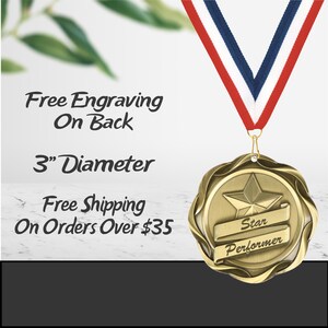 May include: A gold medal featuring a star and the words "Star Performer" on a banner. The medal is 7.6 cm in diameter and is suspended from a red, white, and blue ribbon. The image includes the text "Free Engraving On Back".