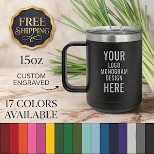 May include: A black 15oz stainless steel travel mug with a handle and a clear lid. The side of the mug features the engraved text YOUR LOGO MONOGRAM DESIGN HERE. A colour palette of seventeen different shades is displayed at the bottom of the image.