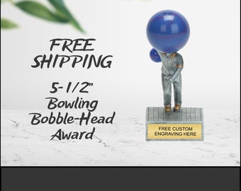 Bowling bobblehead resin figure trophies awards made of silver pewter with gold trim.   Personalized with your own custom engraving.