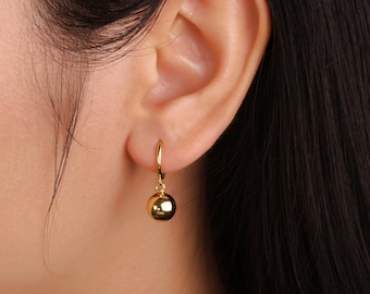 Hanging ball earrings deals