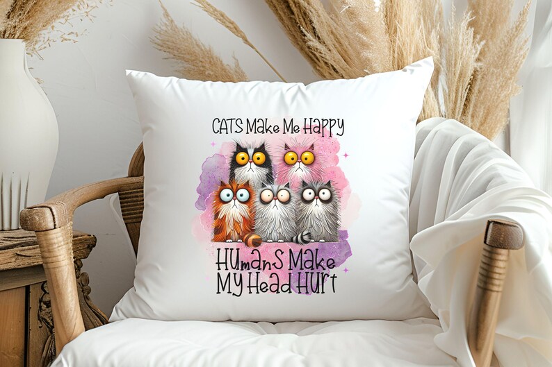 May include: White throw pillow with a colorful illustration of five cats and the text "Cats Make Me Happy Humans Make My Head Hurt".