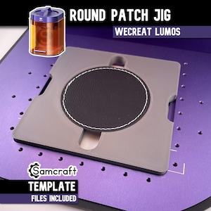 May include: A grey square jig with a circular cutout holding a black round patch with white stitching. The text Round Patch Jig Wecreat Lumos and Samcraft Template Files Included is visible. The jig sits on a purple surface with a grid of holes.