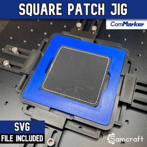 May include: A black and blue square patch jig with the text SQUARE PATCH JIG and ComMarker logo visible. The device features a central black square patch with white stitching, held by a blue frame and black adjustable brackets on a base.