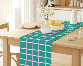 Caminho de mesa com estampa de xadrez verde e rosa desenhado à mão e divertido design boho